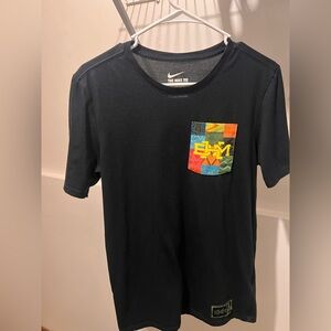 Nike Black Short Sleeve Tee with Multicolor Black History Month Patch Pocket